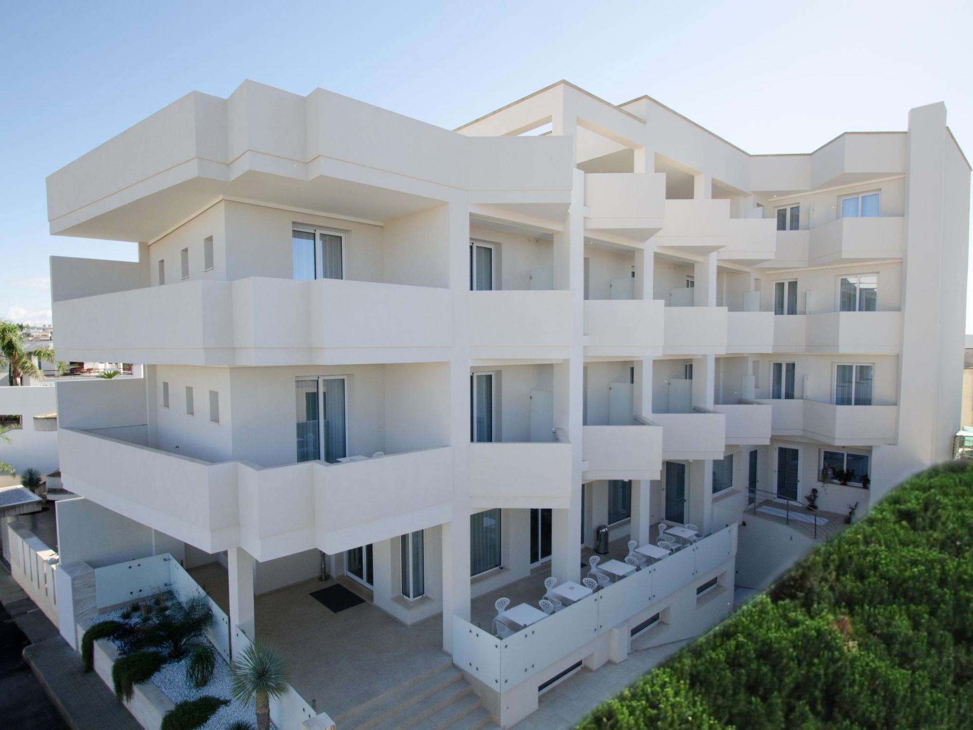 Quihotel Порто Чезарео Екстериор снимка