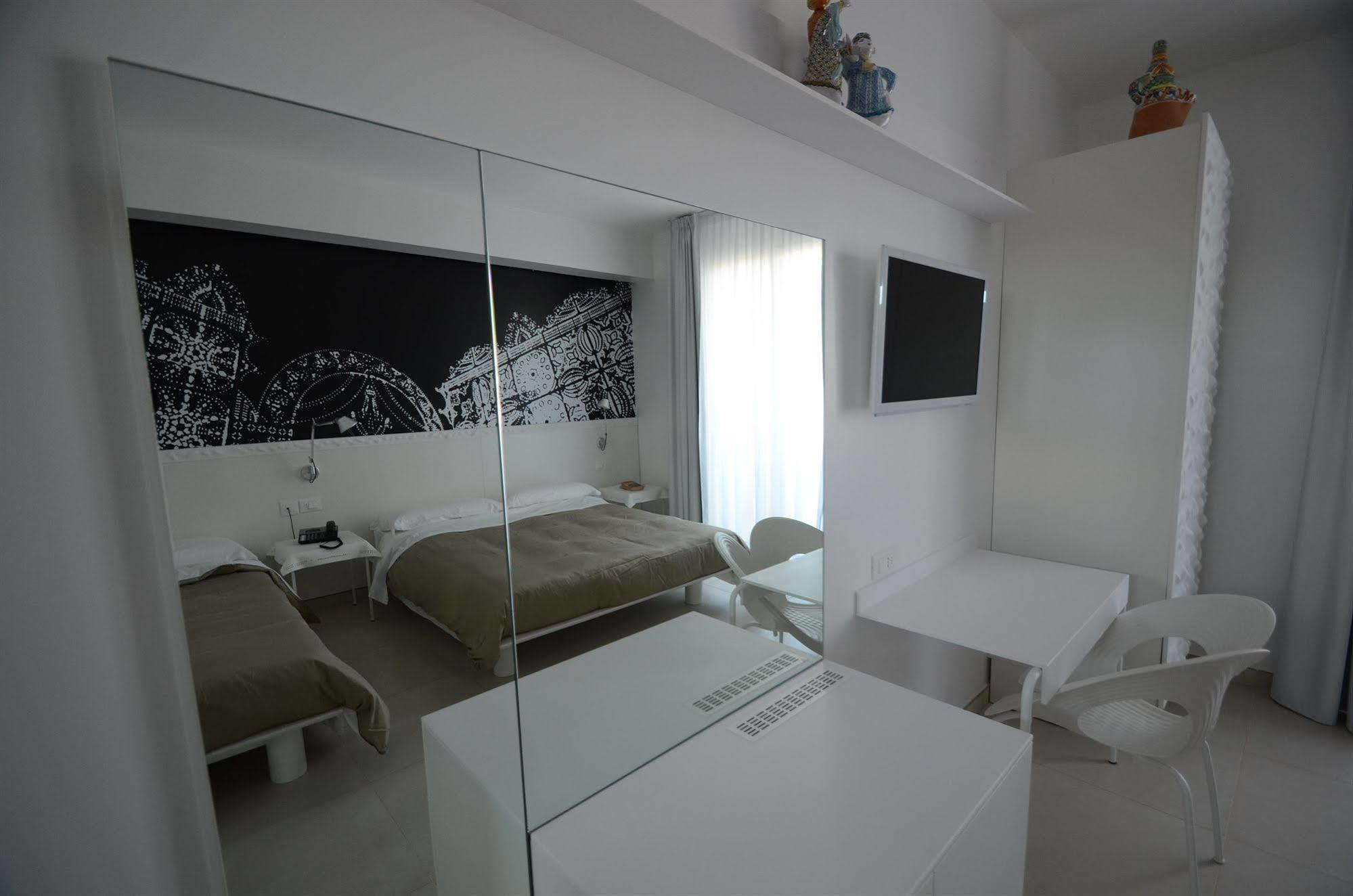 Quihotel Порто Чезарео Екстериор снимка